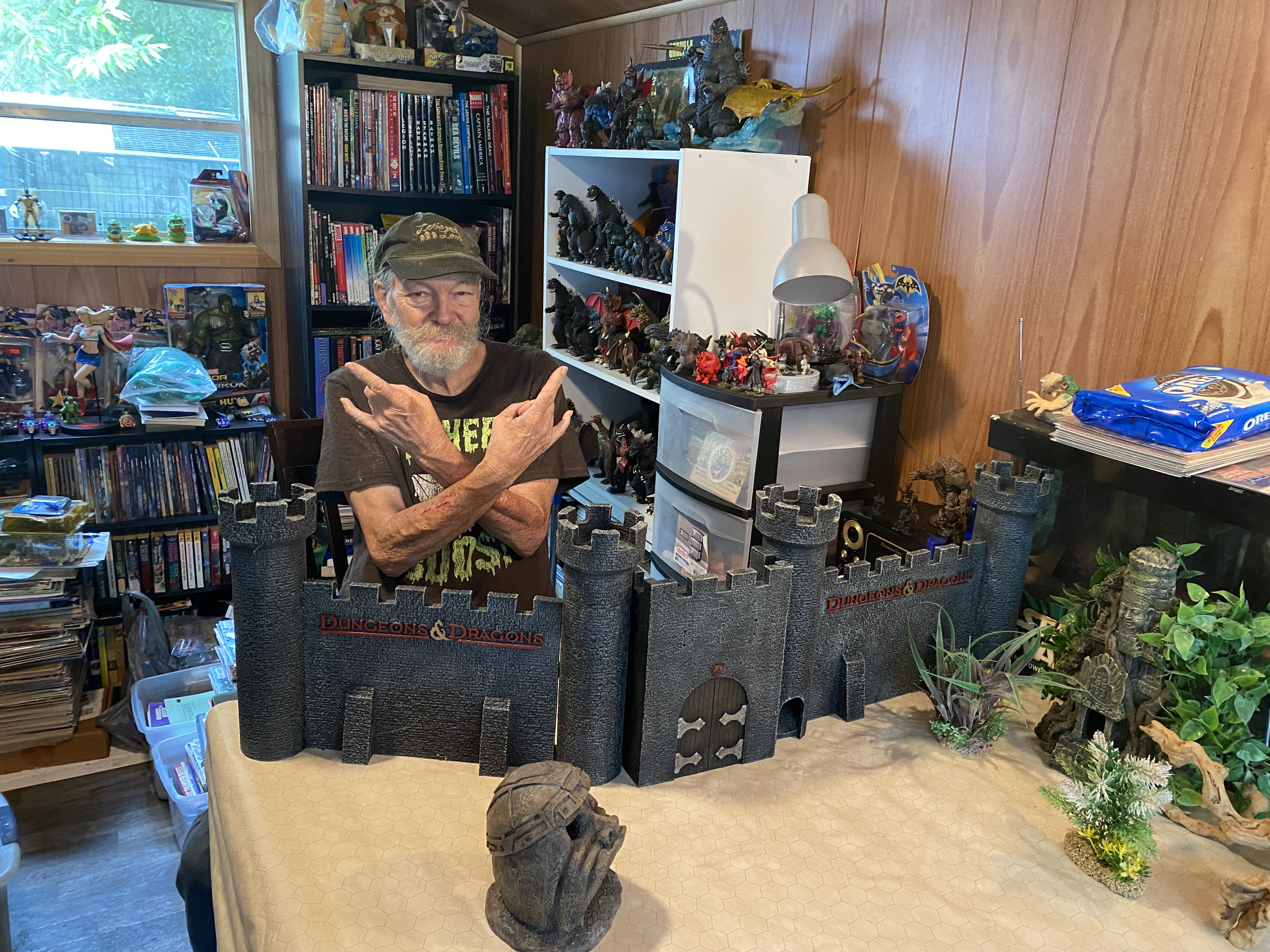 John Lewis standing behind a castle setup